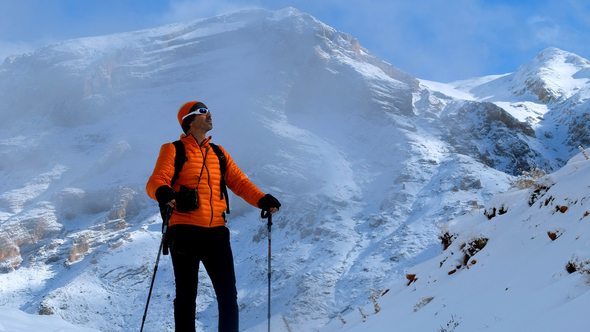 Hiker Man On Foggy Snowy Mountain alt