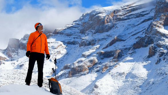 Man Hiker Looks Around alt