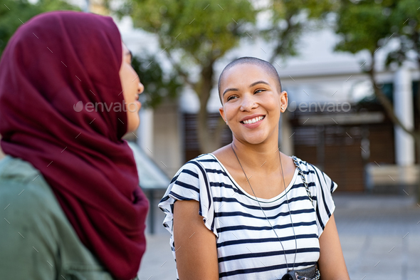 Muslim woman with friend - Stock Photo - Images