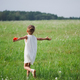 little girl with poppy in summer field - PhotoDune Item for Sale