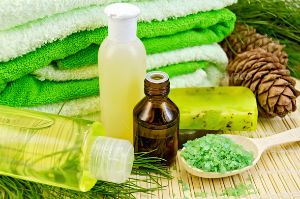 Oil and toiletries with cedar cones - Stock Photo - Images