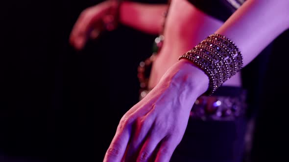 Belly Dancer is Moving Hips Closeup View on Sexy Female Body Dancing in Darkness alt