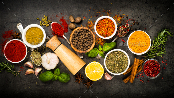 Set of various spices on black background