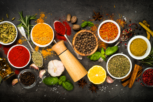 Set of various spices on black background