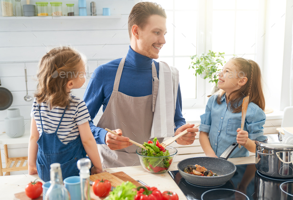 Happy Family In The Kitchen Stock Photo By Choreograph Photodune