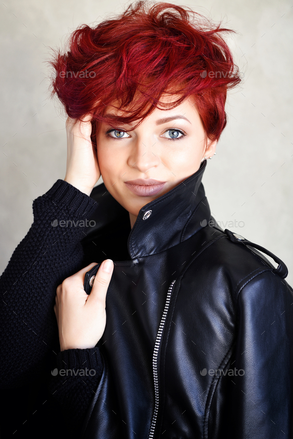 Portrait of a beautiful young red-haired woman with short hair l - Stock Photo - Images