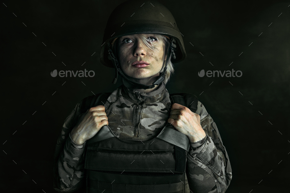 Portrait of young female soldier - Stock Photo - Images