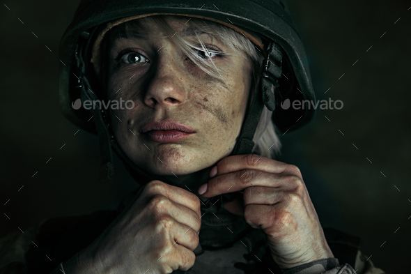 Portrait of young female soldier - Stock Photo - Images