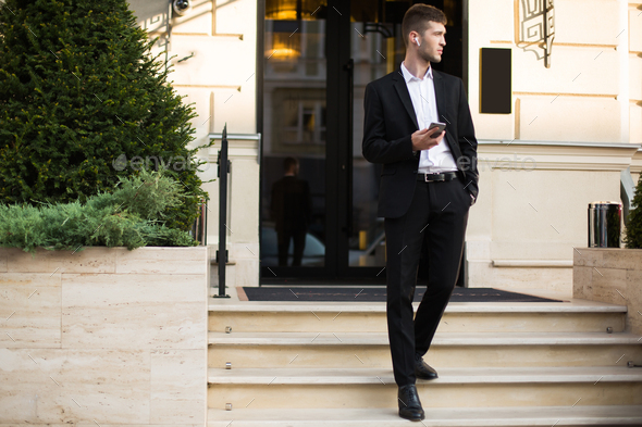 handsome man in black suit