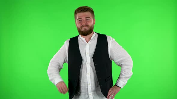 Man Is Reporting and Tells a Lot of Interesting Informations. Green Screen alt