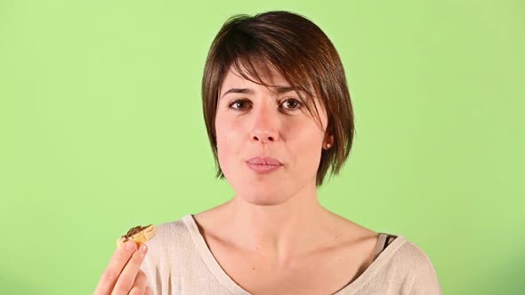 Young Woman Eating Chocolate Cream alt