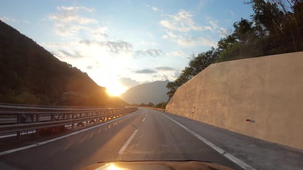 Summer Road Trip on Europe, First-person View of a Moving Car on a Highway, Natural Landscape on alt