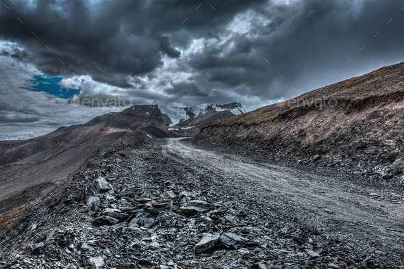 Road in Himalayas with mountains - Stock Photo - Images