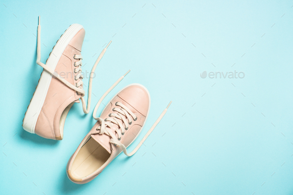 Woman fashion pink shoes on blue background Stock Photo by Nadianb