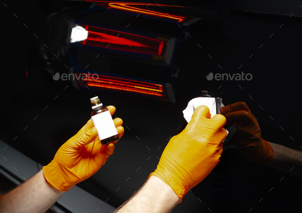 Car polish wax worker hands polishing car - Stock Photo - Images