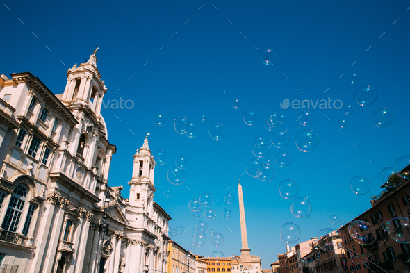 Rome, Italy. Soap Bubbles On Background Of Sant\'agnese In Piazza