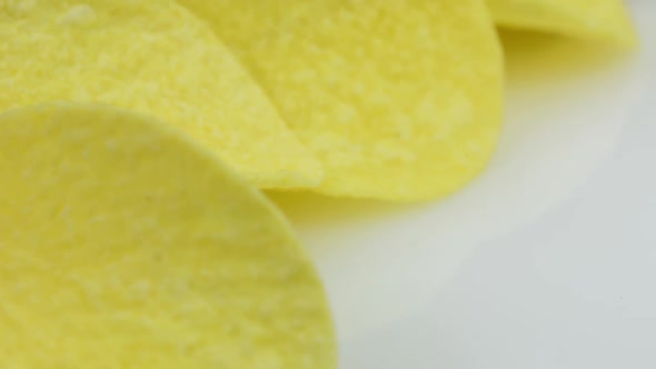 craft potato chips with cheddar cheese, rotating close up alt