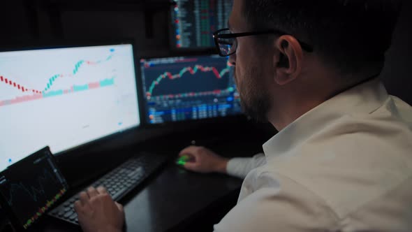 Trader Works with Stock Market Data Timelapse