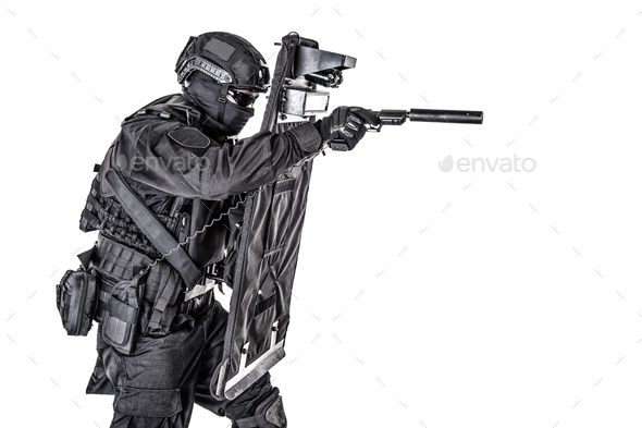 SWAT fighter hiding behind ballistic shield on white - Stock Photo - Images