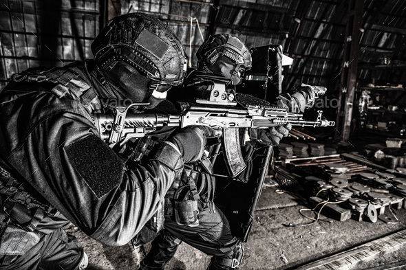 Police special reaction team squad attacking criminals - Stock Photo - Images
