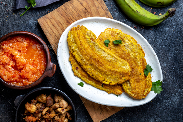 Colombian Caribbean Food. Patacon or Toston, Fried and Flattened Whole Green Plantain Banana