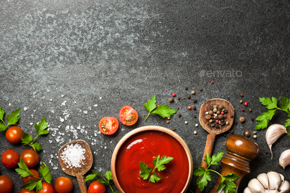 Cooking background with spices, tomatoes and sauce Stock Photo by ff-photo