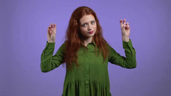 Pretty Woman with Red Hair Showing with Hands and Two Fingers Air Quotes Gesture Bend Fingers alt