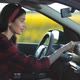 Woman Using Navigation App on Smartphone in Car - VideoHive Item for Sale