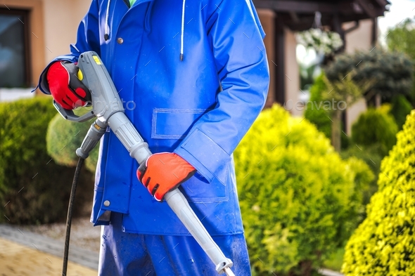 Pressure Washer in Hands - Stock Photo - Images