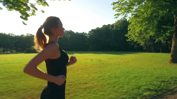 Runner Woman Running In Park Exercising Outdoors 8 alt