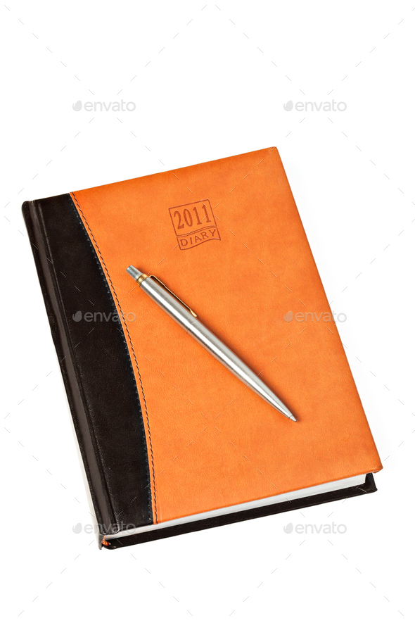 Diary and pen on table isolated - Stock Photo - Images
