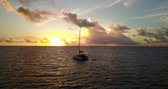 Luxury drone travel shot of a sunshine white sandy paradise beach and aqua turquoise water backgroun alt