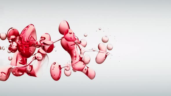 Red Oil Bubbles White Background Highspeed Vertical Video Studio Shot