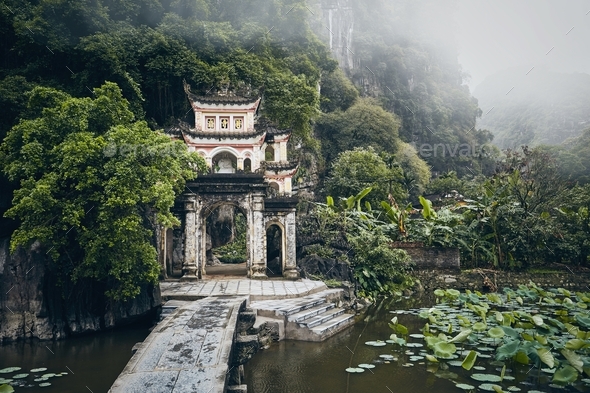 Old temple in the middle of Vietnamese nature Stock Photo by Chalabala