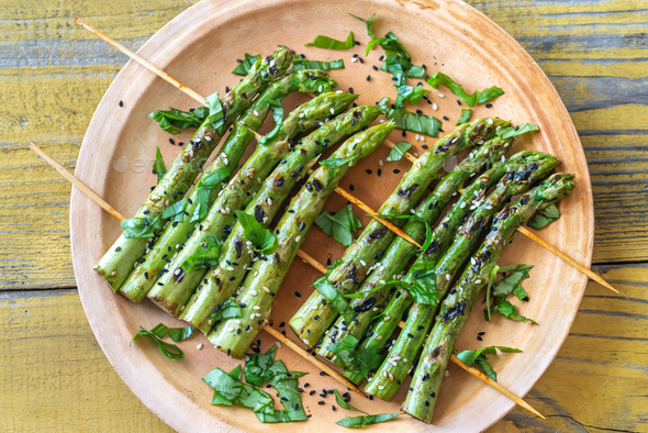 Grilled asparagus rafts with sesame seeds