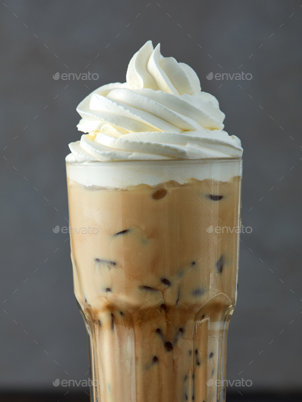 iced coffee latte with whipped cream Stock Photo by magone