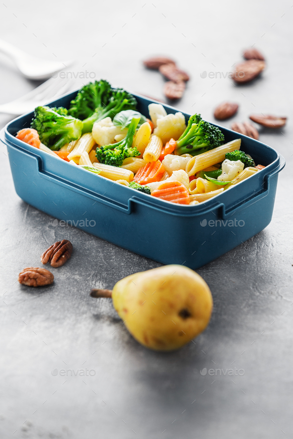 Healthy lunch to go served in box with vegetables