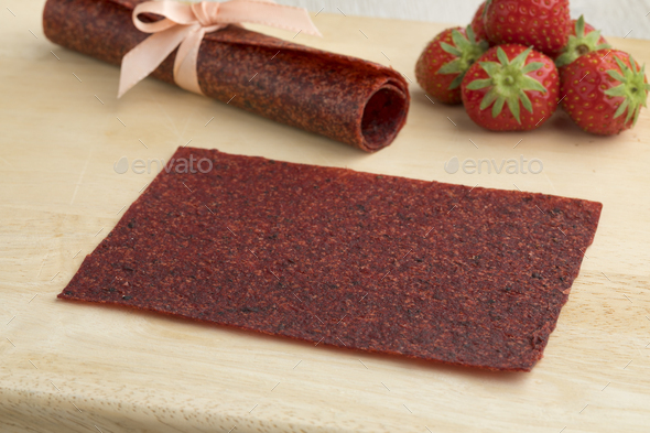 Sheetl of fruit leather as a naturally sweet snack and fresh str