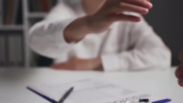 Closeup Handshake, Insurance Agent Girl Shaking Hands With Client Symbol Concept Of Successful Deal alt