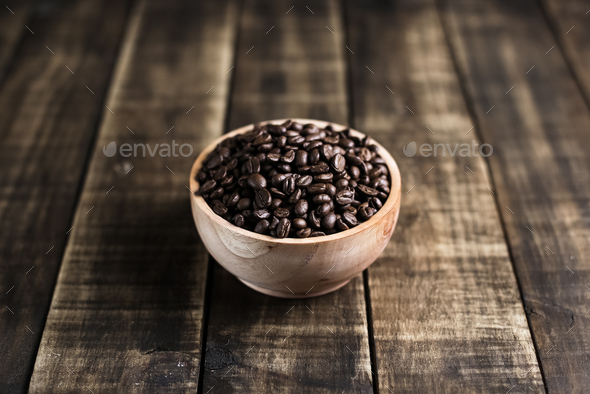 coffee beans with wooden bowl