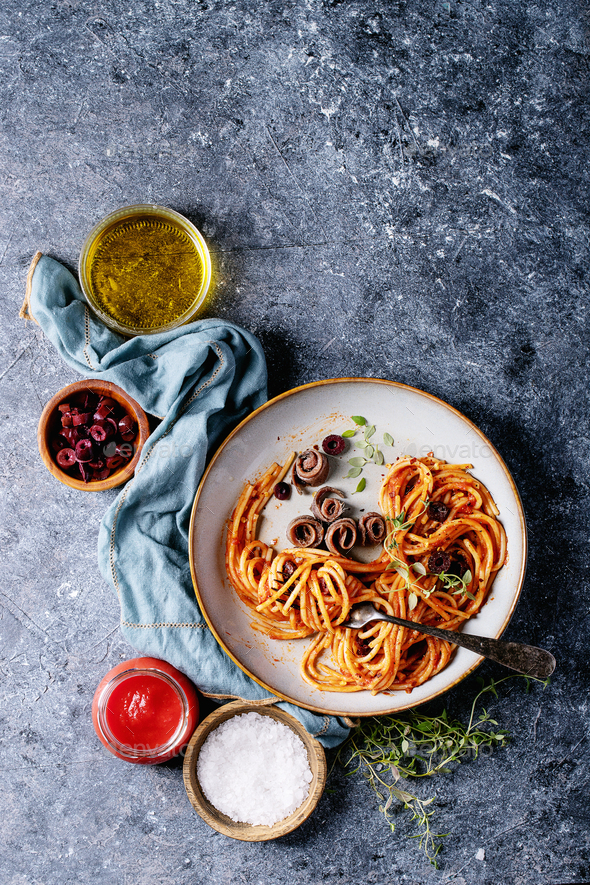 Classic Italian Spaghetti anchovy pasta Stock Photo by Feirlight