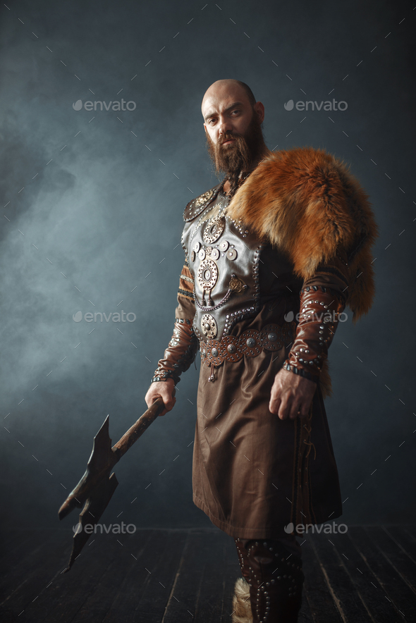 Viking with axe, barbarian, side view Stock Photo by NomadSoul1 | PhotoDune