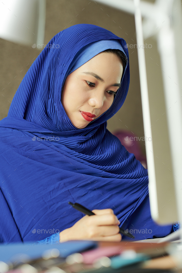 Office manager in hijab - Stock Photo - Images