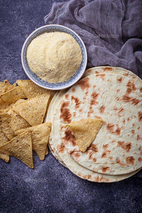 Mexican tortillas, nacho chips and corn flour Stock Photo by furmanphoto