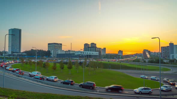 Traffic jam on city roads and dawn, time-lapse alt