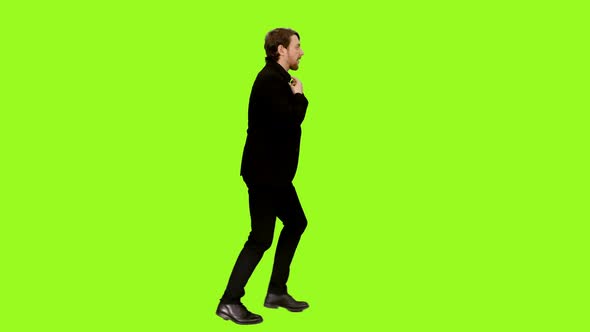 Man In Hurry Is Running To Work On Green Screen, Concept of Late Person