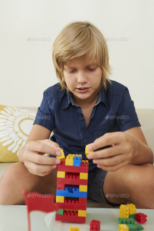 boy playing with blocks