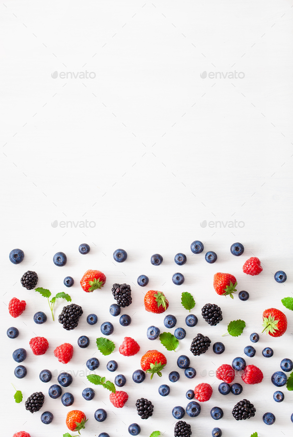 assorted berries over white background. blueberry, strawberry, r