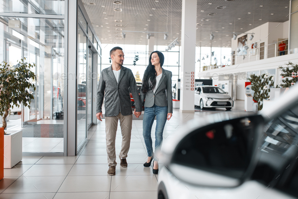Happy Auto Sales >> Happy Couple Buying New Car In Showroom Happy Auto Sales >> Happy Couple Buying New Car In Showroom
