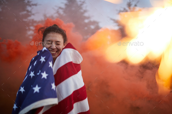 Excited woman against firework